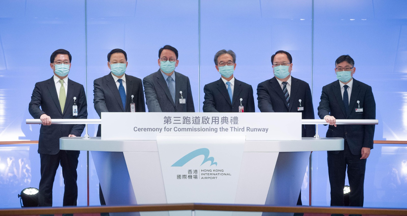 Photo shows (from left) the Chief Executive Officer of the Airport Authority Hong Kong(AAHK), Mr Fred Lam; Deputy Director of the Liaison Office of the Central People's Government in the Hong Kong Special Administrative Region (HKSAR) Mr Yin Zonghua; the Chief Secretary for Administration, Mr Chan Kwok-ki; the Chairman of the AAHK, Mr Jack So; Deputy Commissioner of the Office of the Commissioner of the Ministry of Foreign Affairs of the People's Republic of China in the HKSAR Mr Pan Yundong; and me, officiating at the Ceremony for the Commissioning of the Third Runway of Hong Kong International Airport yesterday.