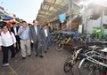 The Secretary for Transport and Housing, Mr Frank Chan Fan (front row, third left), inspects bicycle parking near the ferry pier during his visit to Cheung Chau today (November 10). 