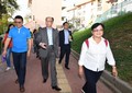 The Secretary for Transport and Housing, Mr Frank Chan Fan (front row, centre), visited Cheung Chau today (November 10). He is briefed by the District Councillors on a proposal to build hillside elevator links at Cheung Kwai Estate. 