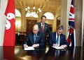 The Secretary for Transport and Housing and Chairman of the Hong Kong Maritime and Port Board, Mr Frank Chan Fan (left), signs a Memorandum of Understanding (MoU) with the Chairman of Maritime London, Lord Jeffrey Mountevans (right), on Sep 12 (London time), witnessed by the Minister of State at the Department for Transport of the United Kingdom, Mr John Hayes (centre). The MoU with Maritime London focuses on collaboration in manpower development and the promotion of maritime services for mutual benefits.