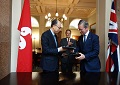 The Secretary for Transport and Housing and Chairman of the Hong Kong Maritime and Port Board, Mr Frank Chan Fan (left), exchanges the signed Memorandum of Understanding with the Chairman of Maritime London, Lord Jeffrey Mountevans (right), on September 12 (London time). The signing ceremony was witnessed by the Minister of State at the Department for Transport of the United Kingdom, Mr John Hayes (centre).